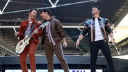 Die Jonas Brothers auf der Bühne. © picture alliance / empics Foto: Isabel Infantes