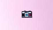 Ein Nähsticker in Form einer Kamera auf rosa Hintergrund. © go2 / photocase.de Foto: go2 / photocase.de