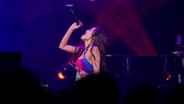 Die Sängerin Olivia Rodrigo live auf der Bühne. © picture alliance / Amy Harris/Invision/AP Foto: Amy Harris