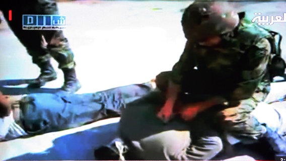 Fernsehbilder von Gräueltaten in Syrien  Foto: Al ArabiyaHandout